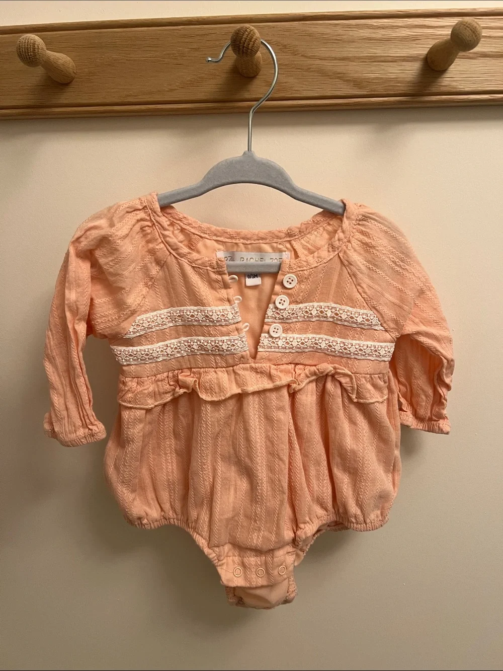 Rachel Zoe Peach Lace-Trim Long Sleeve Baby One-Piece